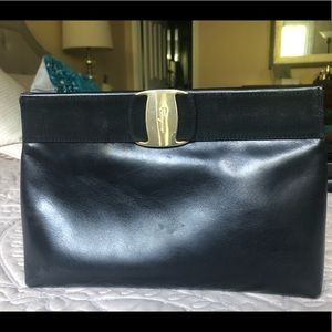 Ferragamo clutch with attached strap